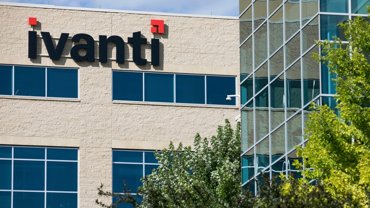 Ivanti logo on the side of a beige building with blue tinted window Ivanti logo on the side of a beige building with blue tinted window