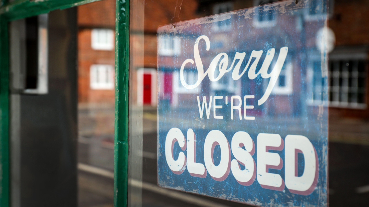 A closed sign in a shop window