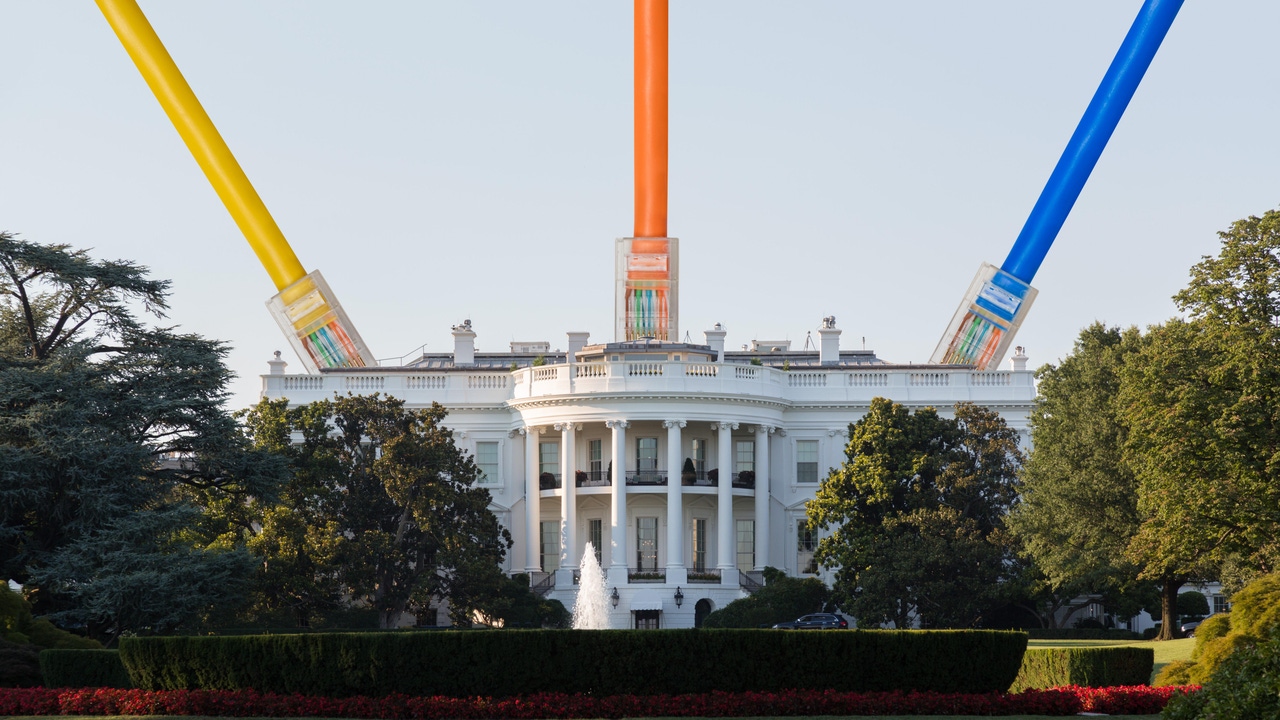 White House with cables attached to the roof to symbolize hack of government data