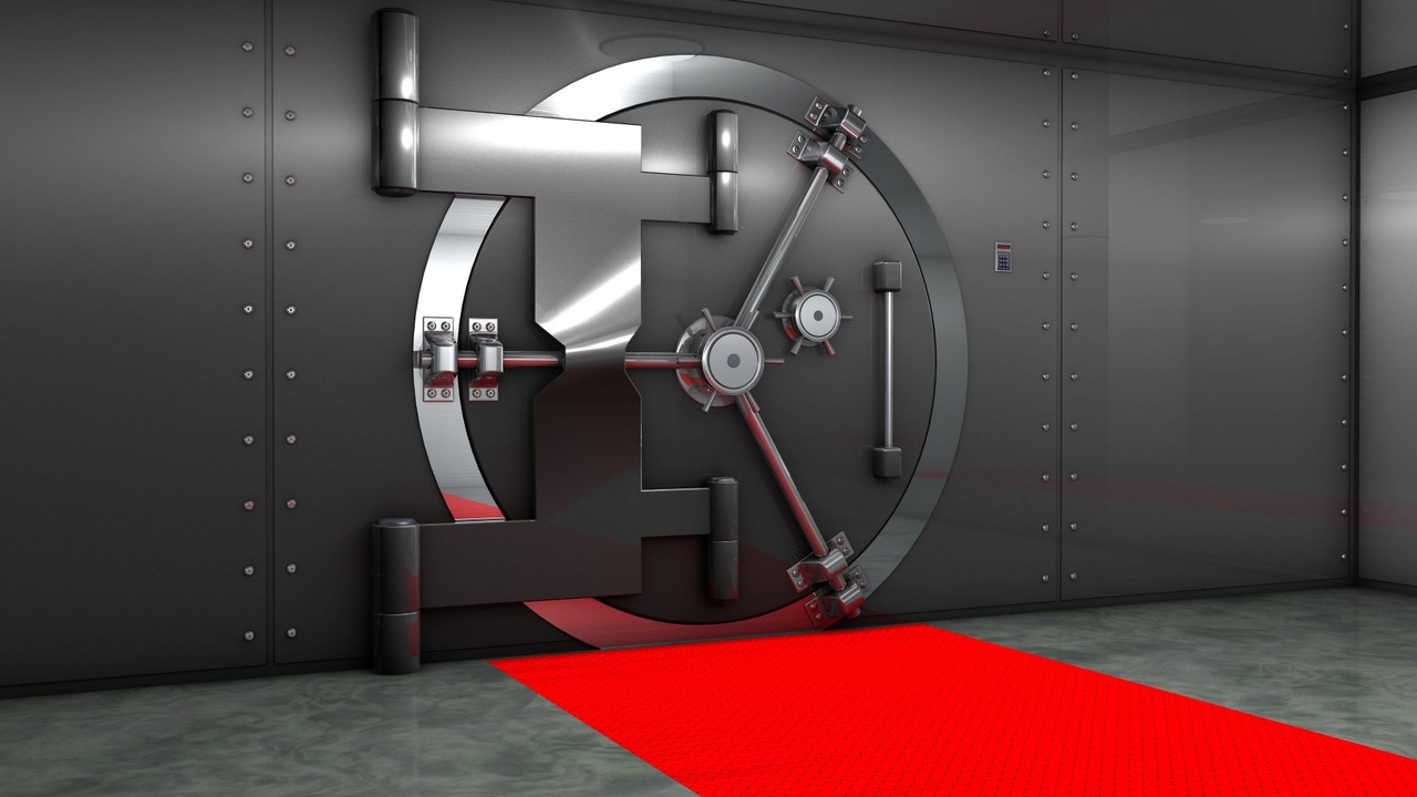 Bank vault door with a red carpet leading up to it Bank vault door with a red carpet leading up to it